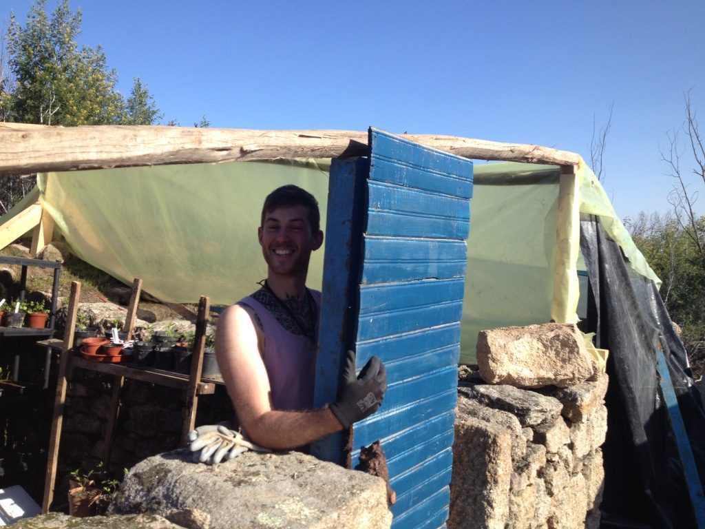Volunteers stripped out our old floor, removed all the nails and Dale managed to put them together and make a door for the chicken house!
