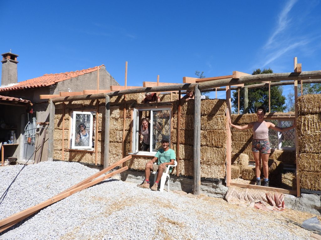 Group of volunteers who are working on the strawbale house