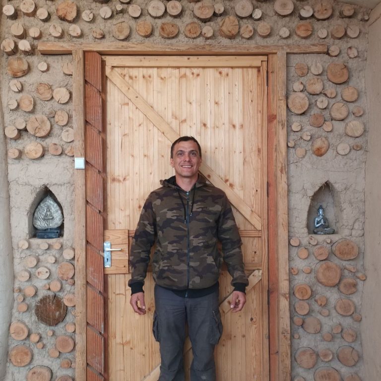 Natural Building - Laurence by homemade yoga room door with cob and cordwood